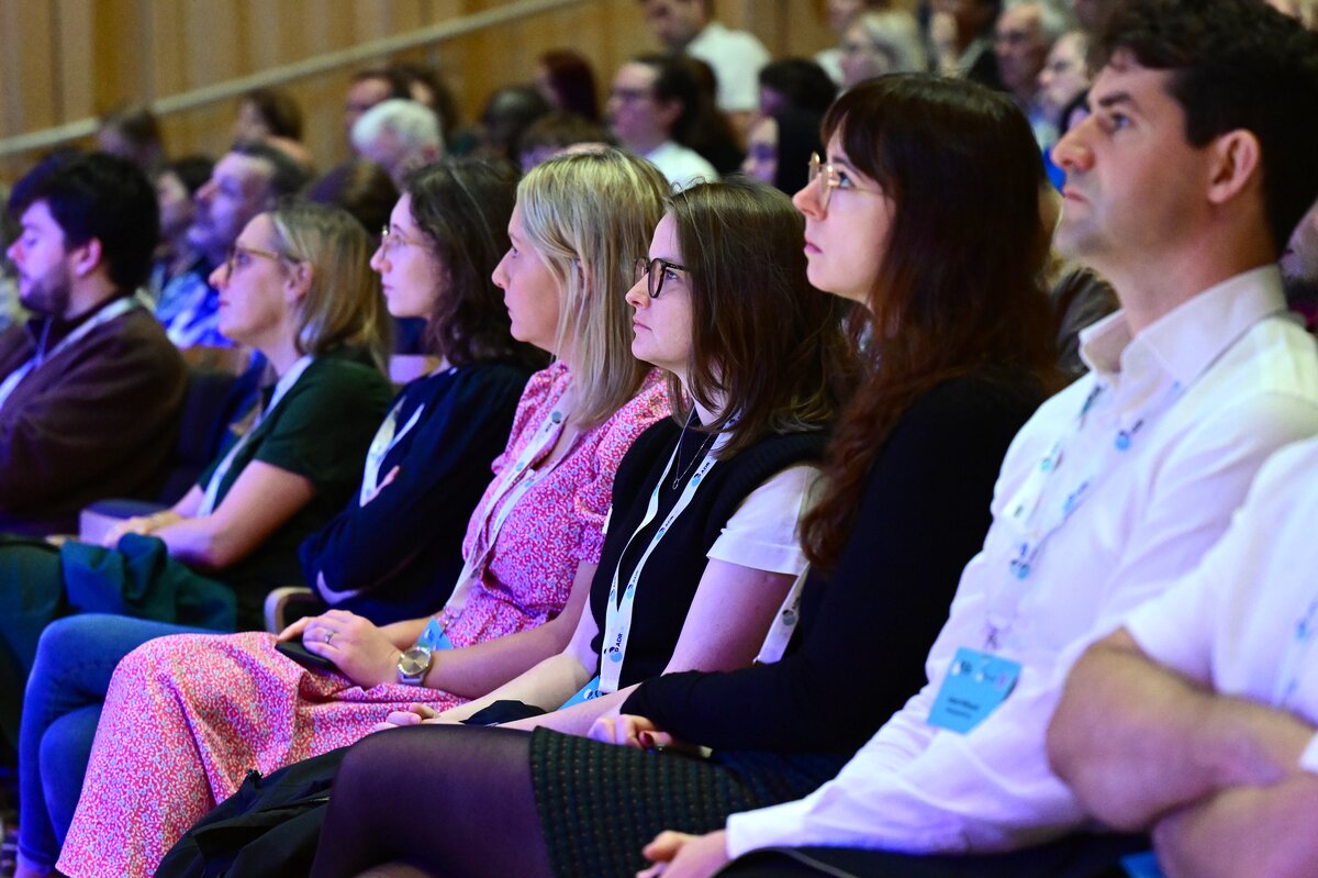 Participants viewing a talk at the ADR UK Conference 2025